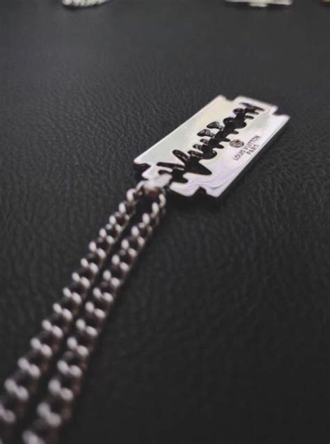 Louis Vuitton razor blade necklace